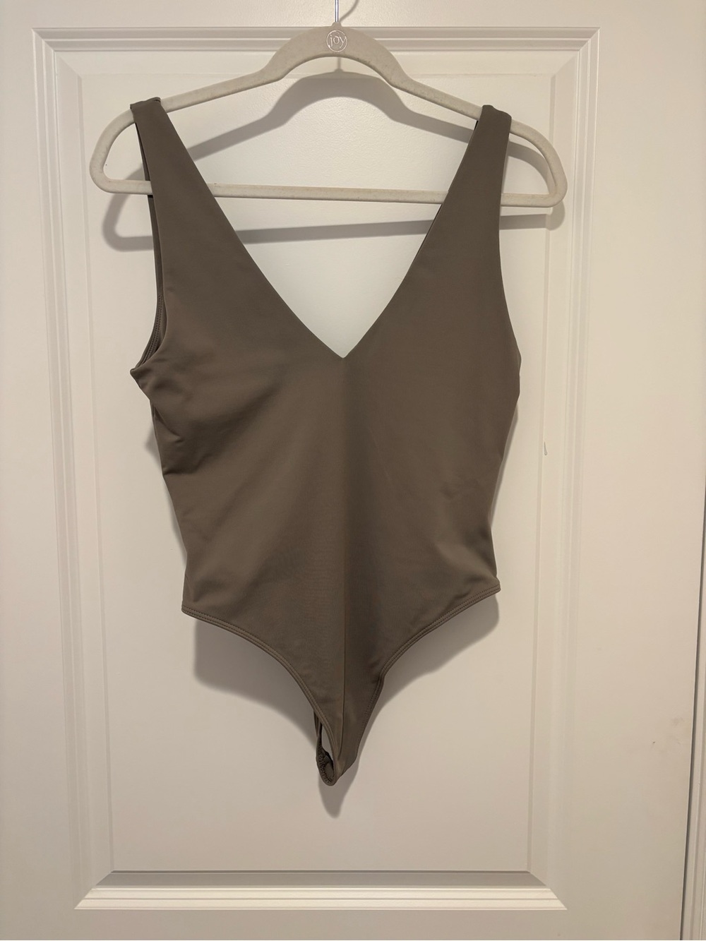 Babaton V‑Neck One‑Piece Bodysuit in Olive Taupe